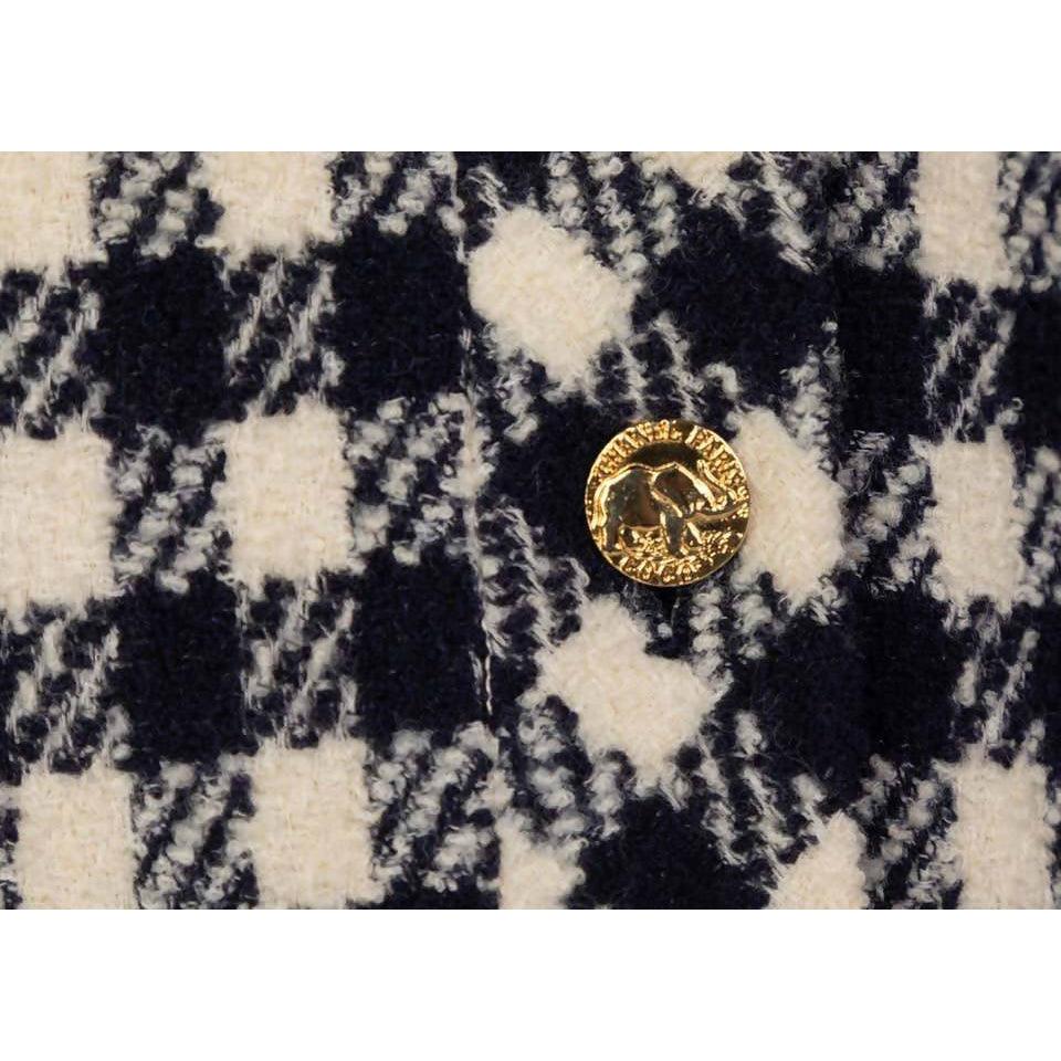 Pre-Owned CHANEL Black & White Wool Cardigan | Size 40FR - theREMODA