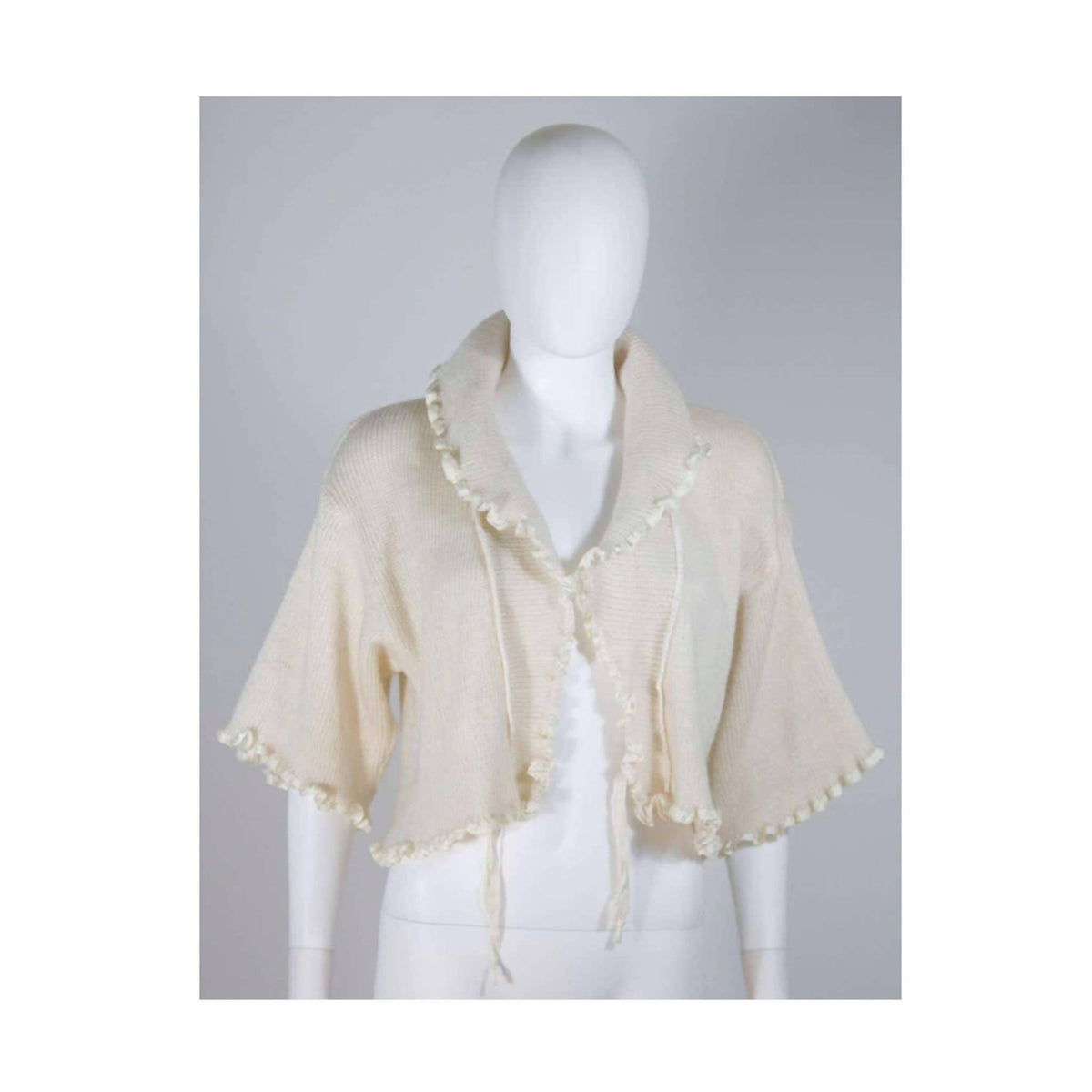 Pre-Owned CHRISTIAN DIOR Cashmere Tie Front Sweater with Ruffled Edges | Size 6 - theREMODA