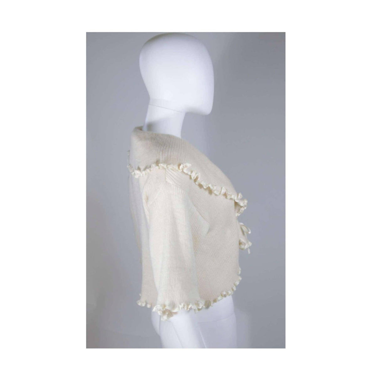 Pre-Owned CHRISTIAN DIOR Cashmere Tie Front Sweater with Ruffled Edges | Size 6 - theREMODA