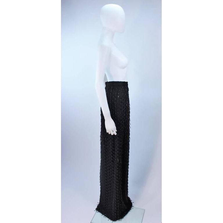 Pre-Owned Black Beaded Fringe Evening Skirt | US 12-14 - theREMODA