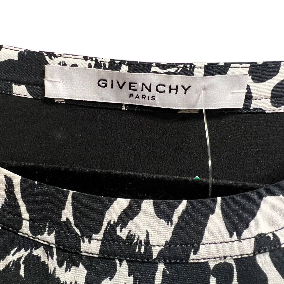 Pre-Owned GIVENCHY Black and White Oval Print Top | Size L - theREMODA